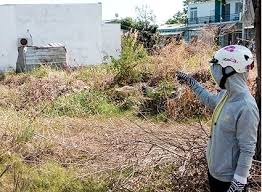 Lấn chiếm đất xây dựng trang trại trên đất nông trường chưa có GCNQSDĐ giải quyết như thế nào?